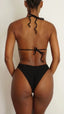 Gsaints model wearing tingle bikini top in black