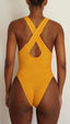 GSaints model backside wearing yellow one piece bathing suit