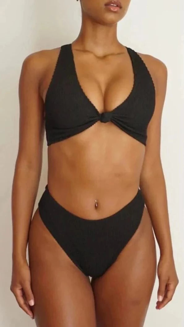 GSaints Model showcasing black high rise bathing suit