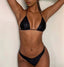Gsaints model wearing metallic black kyma bikini 